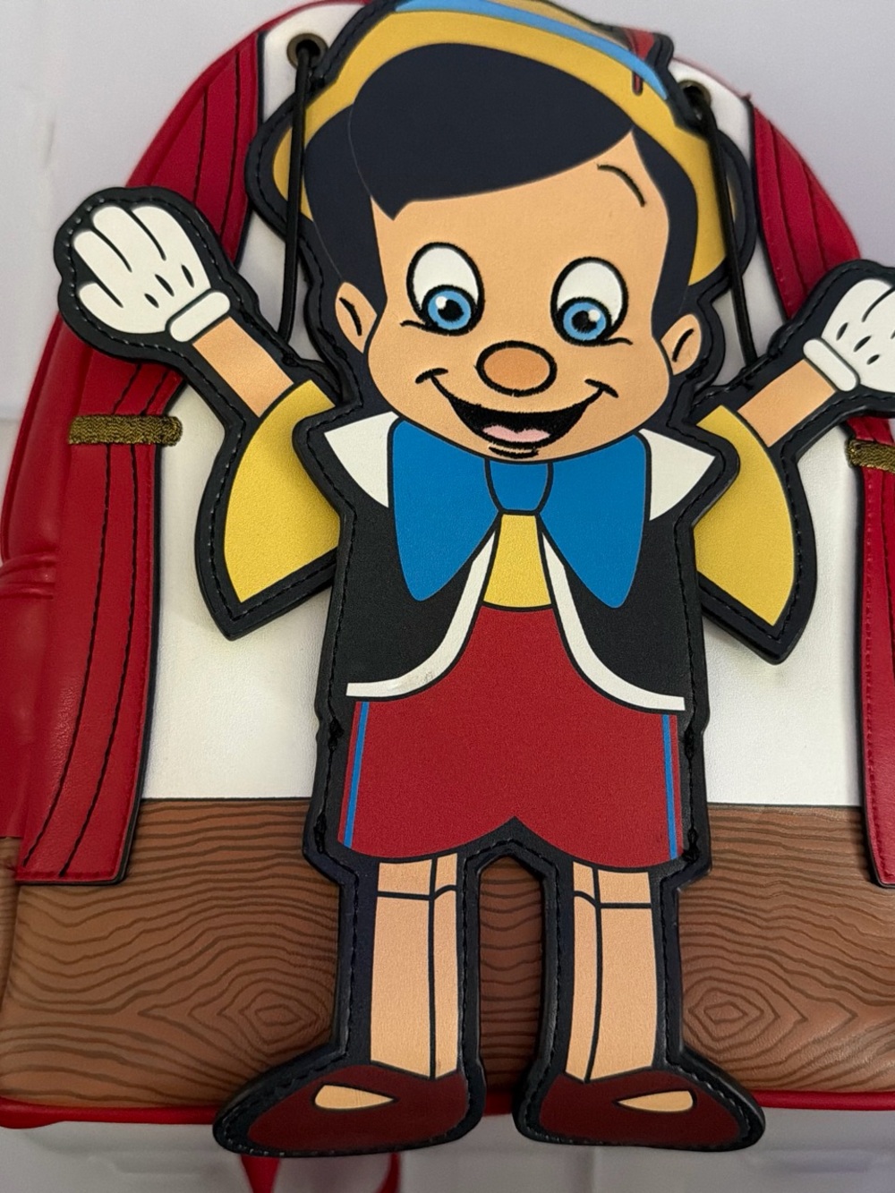 Pinocchio Character Backpack — Red, Blue, Yellow